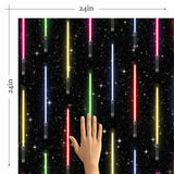 A stunning wall covering from a galaxy far far away! This Star Wars themed peel and stick wallpaper presents vertically arranged light sabers on a starry black background. Exuberant and emphatic, this design is made to make heads turn. At the same time, it has the structured feel of a striped composition, and as such can easily lend itself to formal spaces that enjoy a bit of whimsy.