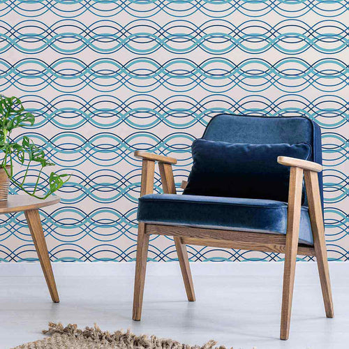 Looking to make waves with your decor choices? Bring home this lovely blue peel and stick wallpaper that pairs geometric sophistication with a breezy nautical vibe. Wave forms in multiple shades of blue run horizontally across its white background and give it a welcoming, relaxed feel that works well in every setting imaginable.&nbsp;Use this PVC-free wallpaper as a different wall treatment for your bathroom, laundry room or even your kitchen backsplash.