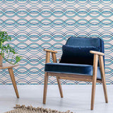 Looking to make waves with your decor choices? Bring home this lovely blue peel and stick wallpaper that pairs geometric sophistication with a breezy nautical vibe. Wave forms in multiple shades of blue run horizontally across its white background and give it a welcoming, relaxed feel that works well in every setting imaginable.&nbsp;Use this PVC-free wallpaper as a different wall treatment for your bathroom, laundry room or even your kitchen backsplash.