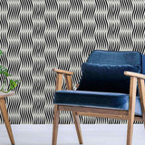 Simple curvilinear forms when you see it up close, and a delightful woven effect when you behold it from afar – this playful geometric wallpaper sure knows how to have fun! This dynamic design is a perfect fix for utility spaces that need an element of depth and interest. It produces the effect of a fabric wall covering, while keeping things simple and structured with its black and white palette.