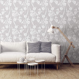 Scattering artistic all-white flowers all over a gray background removable wallpaper